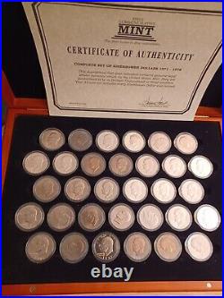 COMPLETE SET OF EISENHOWER DOLLARS 1971 1978 (32 coins) 12'x16.5' display case