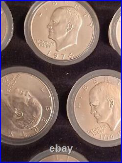COMPLETE SET OF EISENHOWER DOLLARS 1971 1978 (32 coins) 12'x16.5' display case
