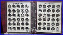 Complete 300 coin set of National Parks Quarters in CAPS binders