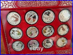 Complete set with display case. Canada Silver Lunar Lotus Coin Series with COA